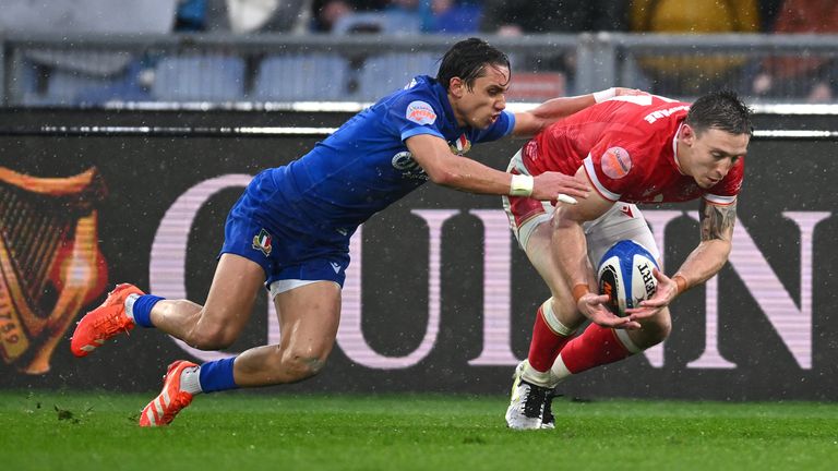 Josh Adams knocked on over the try line twice as the conditions wreaked havoc on Wales' hopes