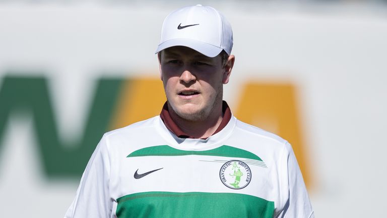 Robert MacIntyre wears a Oban Celtic Shinty club jersey on hole 16 during the third round of the WM Phoenix Open