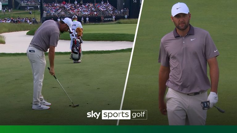 Scottie Scheffler was disappointed with his approach at the 14th and smashed the ground in frustration 