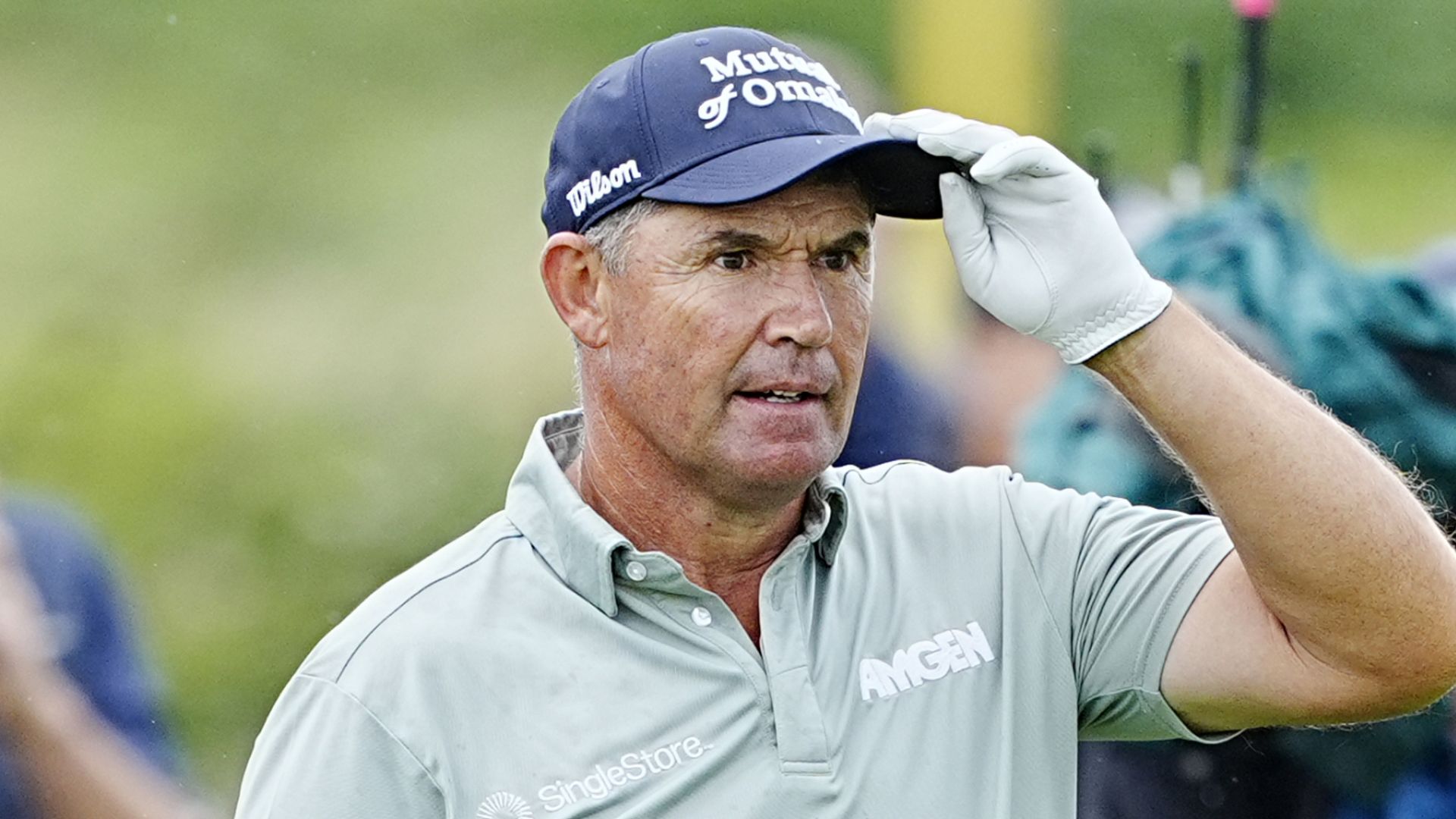 Harrington leads Senior British Open after late birdie 