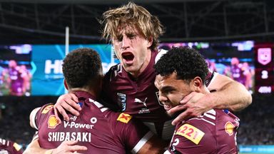 Queensland captain Cameron Munster (centre) leads the celebrations