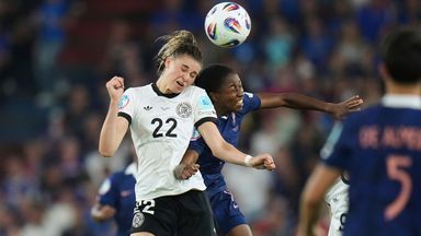 Germany's Jule Brand, left, jumps for the ball with France's Oriane Jean-Francois during the Women's Euro 2025 quarterfinals soccer match between France and Germany at St. Jakob-Park in Basel, Switzerland, Saturday, July 19, 2025. (AP Photo/Alessandr
