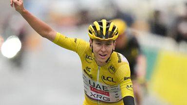 Tour de France winner Tadej Pogacar crosses the finish line of the twenty-first stage