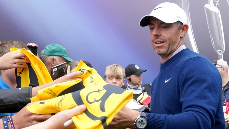 Rory McIlroy signed autographs for fans after his 18-hole practice round on Monday morning 