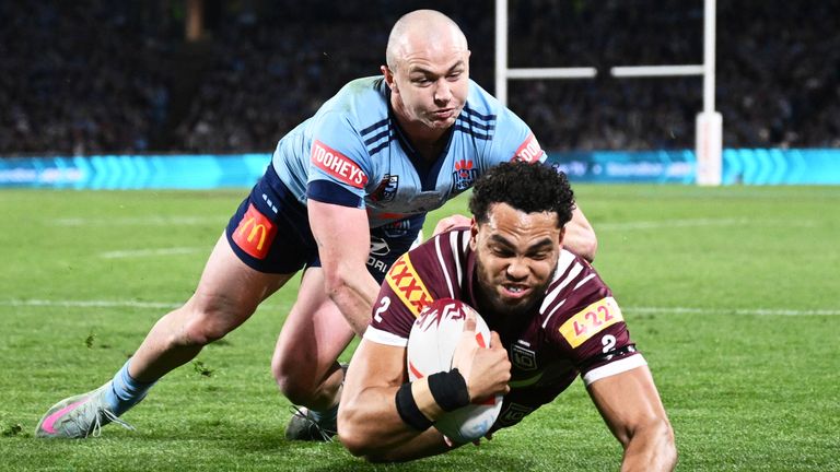Xavier Coates crosses for a try