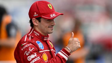 Charles Leclerc celebrates his pole position after qualifying for the Hungarian Grand Prix 