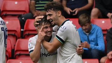Luke Cundle celebrates with team-mate Mihailo Ivanovic after giving Millwall the lead at Sheffield United