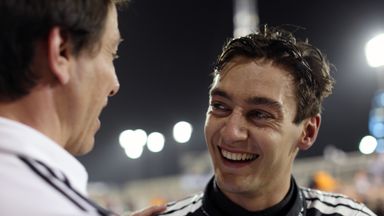 George Russell embraces with Mercedes team principal Toto Wolff after the 2025 Bahrain Grand Prix