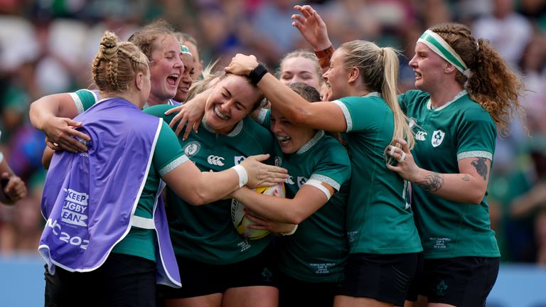 Ireland's Fiona Tuite (third left, with ball) celebrates with her team-mates after scoring her side fourth try