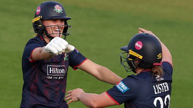 Gaby Lewis (left) and Ailsa Lister (right) celebrate Lancashire's win over Hampshire in the Women's Metro Bank One Day Cup final