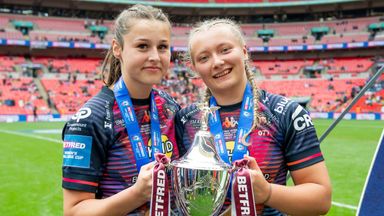 Wigan's Jenna Foubister and Isabel Rowe with the Betfred Women's Challenge Cup trophy