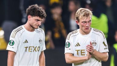 Aberdeen's Dante Polvara (L) and Alexander Jensen look dejected at full time against AEK Athens