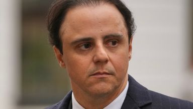 Former Ferrari Formula 1 driver Felipe Massa leaves the Royal Courts of Justice in London (AP Photo/Kin Cheung)