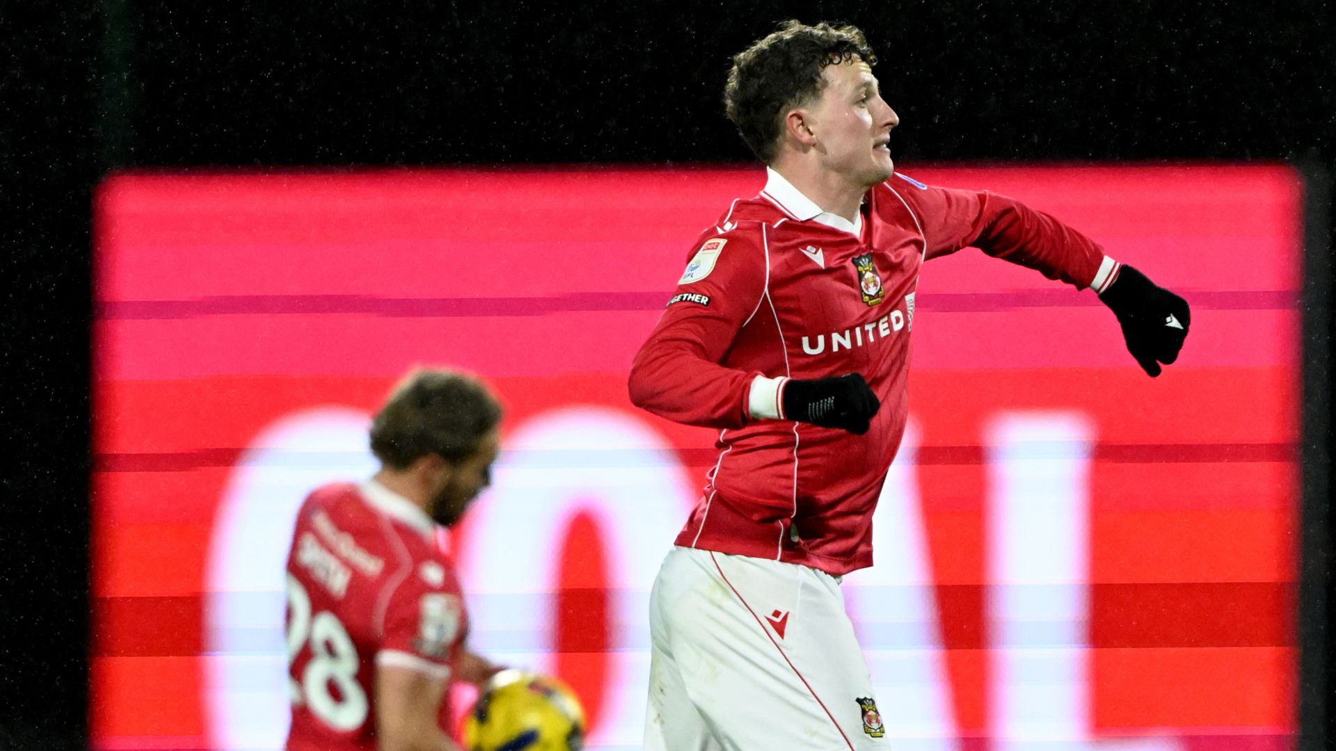 Wrexham strike late to hold Blackburn