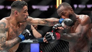 Carlos Prates (left) punches England's Leon Edwards (right) during his win at UFC 322 in New York