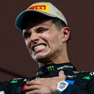 Lando Norris celebrates becoming 2025 F1 world champion at the Abu Dhabi GP