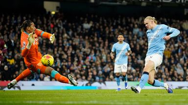 Manchester City's Erling Haaland shoots and scores his sides third goal of the game (AP Photo/Dave Thompson)