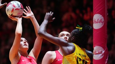 England's Lois Pearson shoots over Jamaica's Kadie-Ann Dehaney (left) and Latanya Wilson (right), during the Vitality Netball Horizon Series