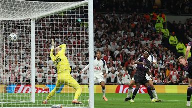 Slavia's David Zima, right, scores an own goal during the Champions League opening phase soccer match between Tottenham and Slavia Prague, in London, England, Tuesday, Dec. 9, 2025. (AP Photo/Richard Pelham)