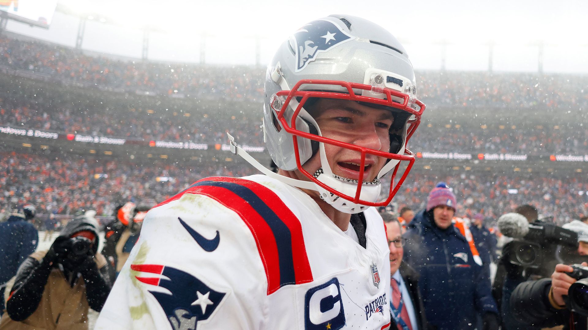 Patriots beat Broncos in near blizzard to book Super Bowl spot