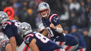 New England Patriots quarterback Drake Maye, top, signals at the line of scrimmage during the first half of an NFL divisional playoff football game against the Houston Texans, Sunday, Jan. 18, 2026, in Foxborough, Mass. (AP Photo/Steven Senne)