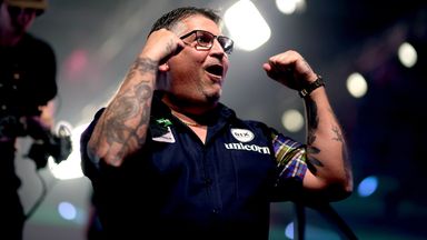 Scotland's Gary Anderson reacts after winning the second set during his match against Netherlands' Michael van Gerwen, on day seventeen of t