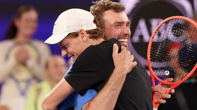 Australia's Jordan Smith embraces Jannik Sinner after beating the world No 2 en route to his One Point Slam triumph