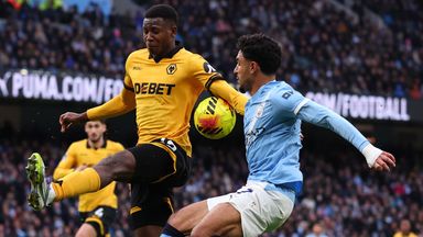 Yerson Mosquera appears to handle the ball after a touch by Omar Marmoush 