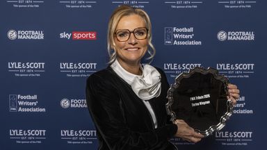 Wiegman proudly displays her award