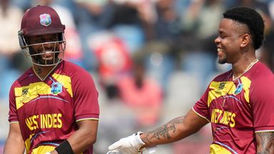 West Indies' Shimron Hetmyer (right) congratulates captain Shai Hope on his unbeaten 61 in their T20 World Cup victory over Nepal