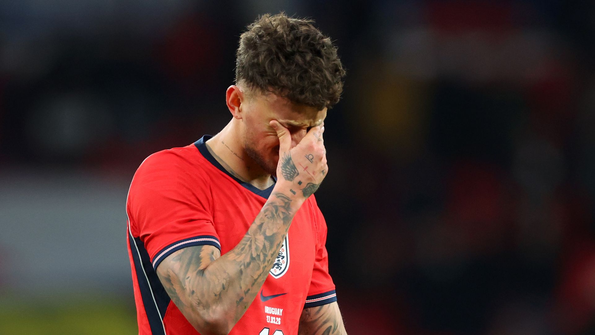 White booed after scoring and gives away penalty in draw with Uruguay