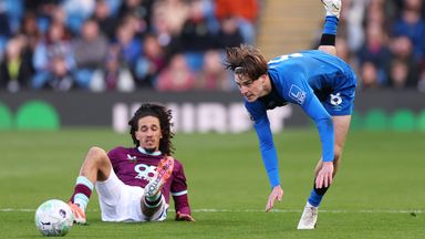 Alex Scottis challenged by Hannibal Mejbri