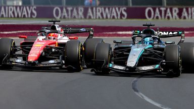Charles Leclerc battles George Russell