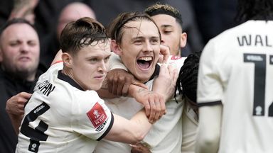 Ben Waine is mobbed by his team-mates after heading Port Vale in front against Sunderland
