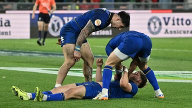Leonardo Marin celebrates after scoring a late try to give Italy a late lead against England