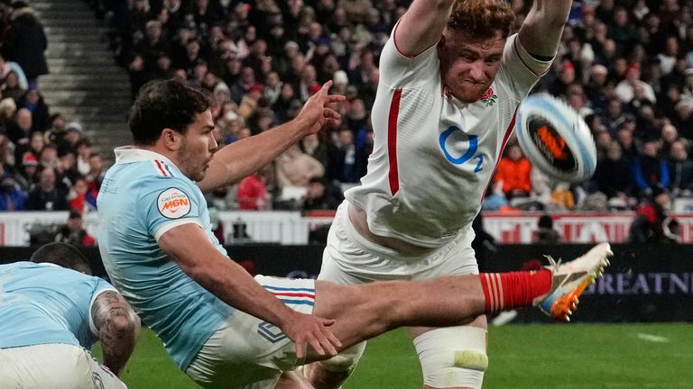 Antoine Dupont of France clears the ball (AP Photo/Michel Euler)