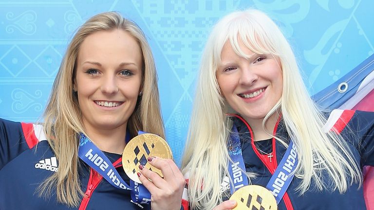 Kelly Gallagher (right) with guide Charlotte Evans (left) after winning gold in the Women's Super-G - Visually Impaired at the Sochi Games