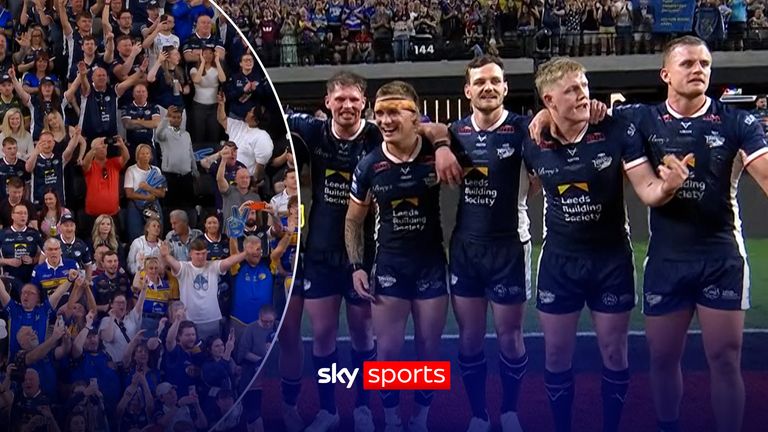 The Leeds players celebrate with their travelling fans in Las Vegas after beating Hull KR