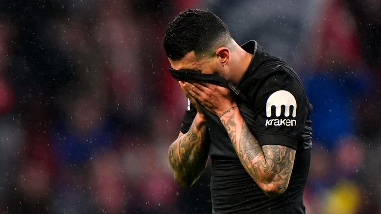 Tottenham Hotspur's Pedro Porro reacts after heavy defeat to Atletico Madrid in Spain