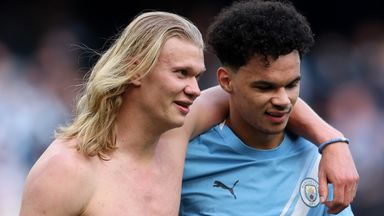 Erling Haaland and Nico O'Reilly celebrate Manchester City's win over Arsenal