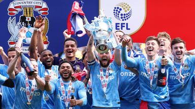 Coventry City captain Matt Grimes lifts the Sky Bet Championship trophy after his team's 3-1 victory over Wrexham