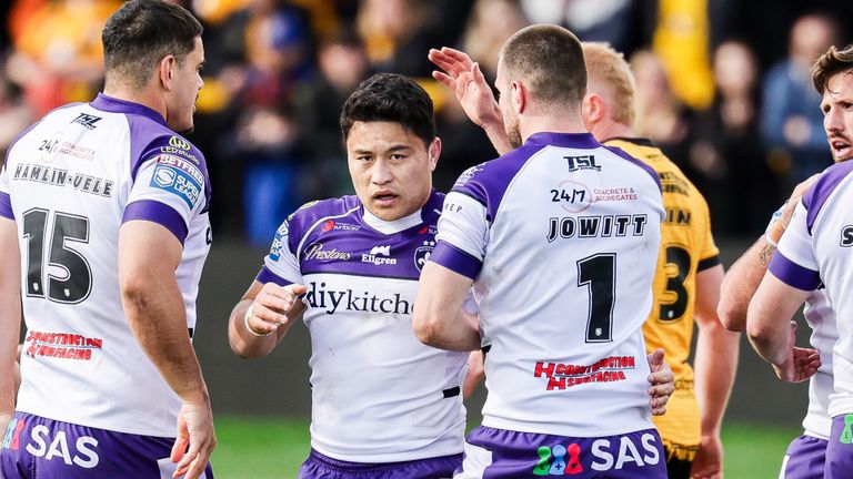 Mason Lino of Wakefield is congratulated by Max Jowitt