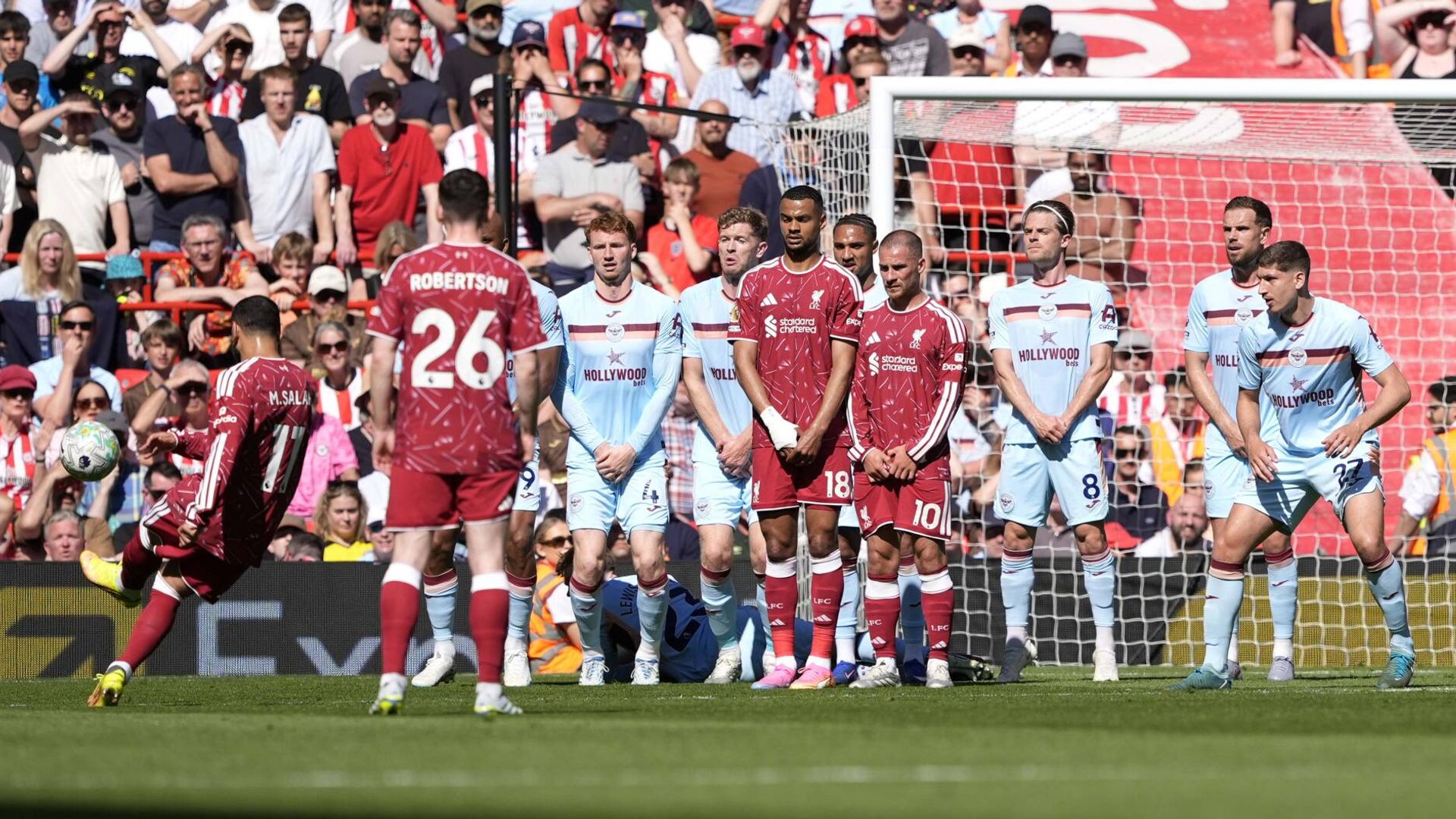 Salah curls the ball against the post for Liverpool against Brentford LIVE!