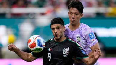 Mexico's Raul Jimenez (9), left, fights for the ball with South Korea's Lee Han-beom (2) during the World Cup Group A soccer match between Mexico and South Korea in Zapopan, near Guadalajara, Mexico, Thursday, June 18, 2026. (AP Photo/Ricardo Mazalan