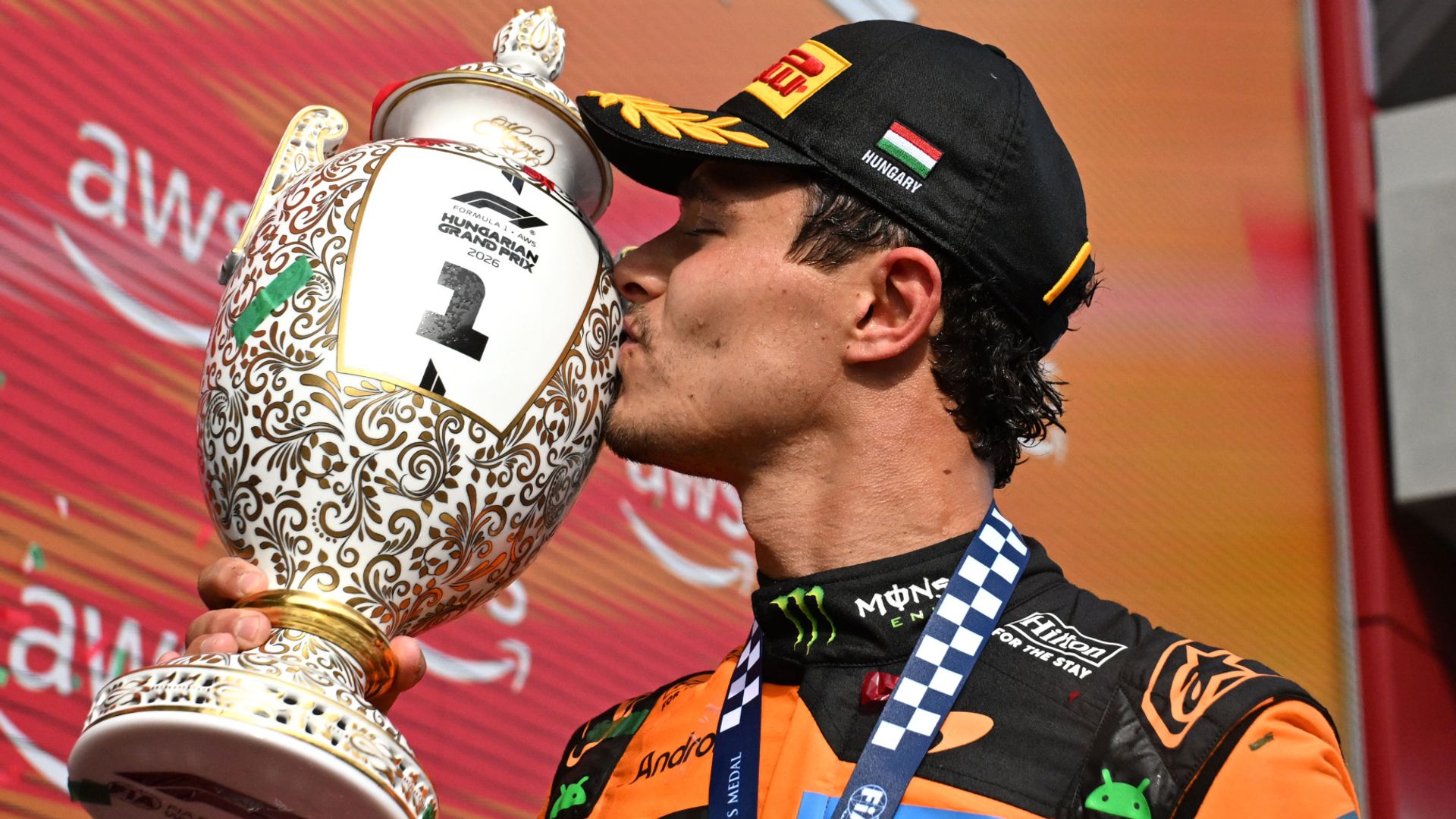 Norris wins first race of 2026 as Hamilton suffers more penalty pain
