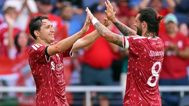 Liverpool's Szoboszlai (right) and Chiesa celebrate their win over Sunderland