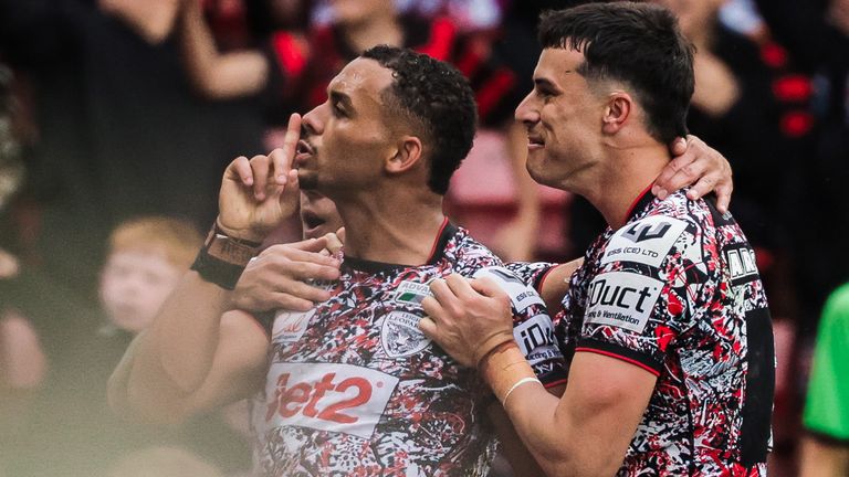 Leigh Leopards celebrate victory against Warrington Wolves