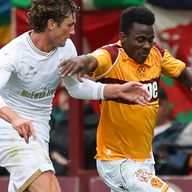 Falkirk's Ben Krauhaus (L) and Motherwell's Ibrahim Said in action at Fir Park