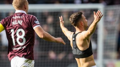 Hearts' Sabah Kerjota (R) celebrates after scoring to make it 2-1