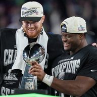 Seattle Seahawks quarterback Sam Darnold and running back Kenneth Walker III celebrate after their Super Bowl win at Levi's Stadium